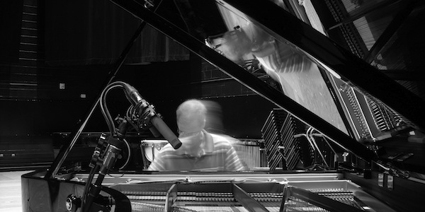 Elias playing piano